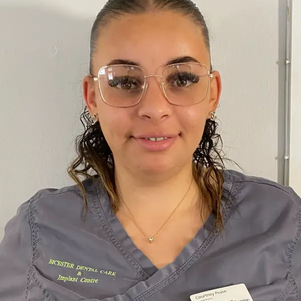 The smiling face of Courtney Pease, one of Bicester Dental's training dental nurses.